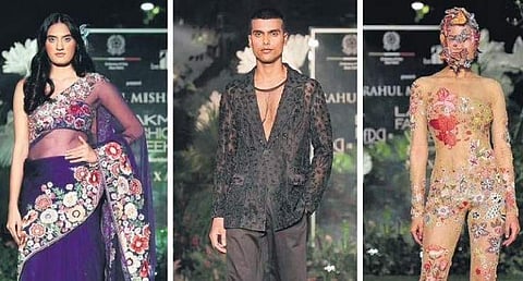 Models donning outfits from designer Rahul Mishra’s collection at the FDCI x Lakmé Fashion Week in Delhi on Tuesday. (File Photo)