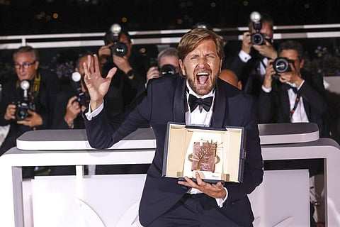 Ruben Ostlund’s class-warfare comedy, Triangle of Sadness won the Palme d’Or at Cannes this year