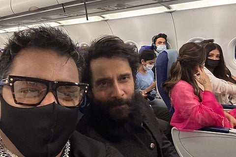 AR Rahman with actors Aishwarya Rai Bachchan, Vikram and Trisha in the flight