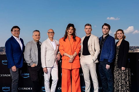 Priyanka's  hair was styled in a messy half-tied ponytail, while her makeup consisted of a berry-toned lip shade hair was styled in a messy half-tied ponytail