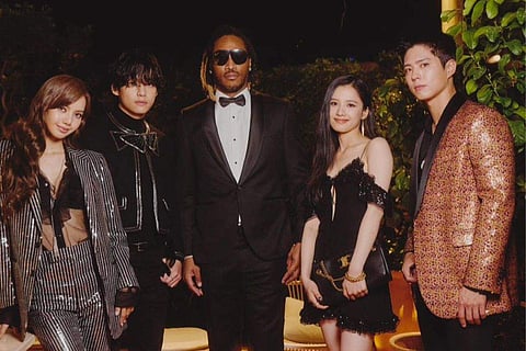 V with other guests at  birthday party in Cannes