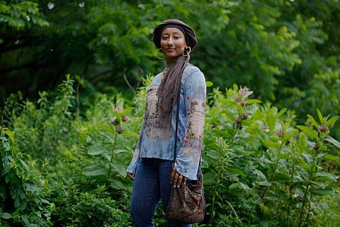 Yasmeen Bekhit, a 22-year-old graduate student, poses for a photograph in her Y2K-inspired outfit near her home in Manheim