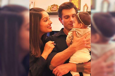 Bipasha Basu and actor Karan Singh Grover with their daughter