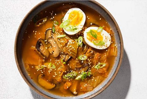 In frame: Miso, Shiitake mushroom and Kimchi soup (Image credit:  Milk Street-AP)