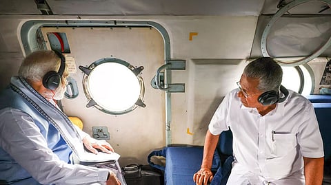 ಭೂಕುಸಿತ ಪೀಡಿತ ಗ್ರಾಮಗಳಲ್ಲಿ ಪ್ರಧಾನಿ ಮೋದಿ ಮತ್ತು ಕೇರಳ ಮುಖ್ಯಮಂತ್ರಿ ಪಿಣರಾಯ್ ವಿಜಯನ್ ವೈಮಾನಿಕ ಸಮೀಕ್ಷೆ 