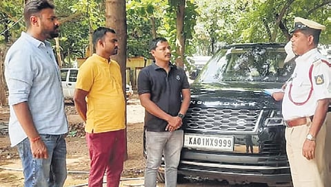 MLA Janardhana Reddy’s car on the premises of Gangavathi police station in Koppal district on Tuesday