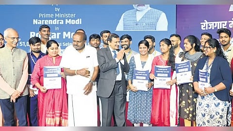 Union Minister for Heavy Industries and Steel HD Kumaraswamy and Bangalore Rural MP Dr CN Manjunath distribute appointment letters to job aspirants in Bengaluru on Tuesday