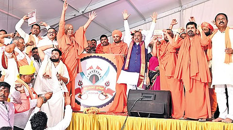 Former DCM K S Eshwarappa and seers during the launch of Krantiveera Brigade in Basavana Bagewadi, Vijayapura district.