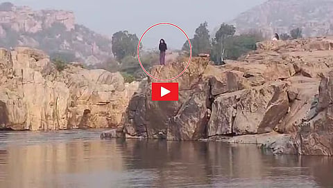 Doctor jumps into river