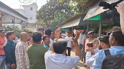 Gathering during raids by the Enforcement Directorate (ED) on premises linked to Chaitanya Baghel, son of former Chhattisgarh Chief Minister and Congress leader Bhupesh Baghel, in connection with an alleged liquor scam, in Bhilai, Monday, March 10, 2025. 