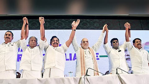 The incoming TN BJP President Nainar Nagendran, outgoing President K Annamalai, Union Home Minister Amit Shah, Deputy General secretary KP Munusamy and SP Velumani are seen. 