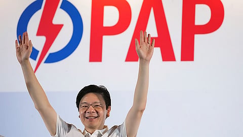 Prime Minister Lawrence Wong's, from People's Action Party (PAP) thanks his supporters and voters at an assembly area for People's Action Party supporters, on the day of the general election in Singapore, Saturday, May 3, 2025.