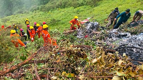 NDRF personnel at the spot after a helicopter crashed near the Kedarnath shrine.
