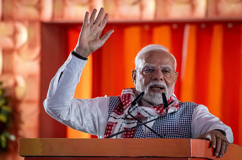 PM Narendra Modi speaks at a public meeting on completion of one year of state government in Odisha, at Janata Maidan in Bhubaneswar on Friday. 