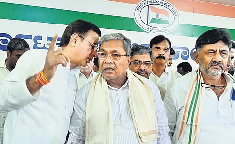 Randeep Singh Surjewala, Siddaramaiah and D K Shivakumar 