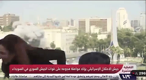 live TV as news reporter flees in terror in Syria