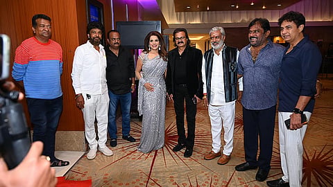 Vijay Tata (fifth from left)