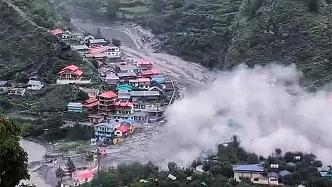 Houses being swept away in a flash flood triggered by a cloudburst at Dharali, in Uttarkashi district, Uttarakhand