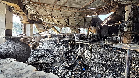 The charred interiors of a nightclub, which caught fire early Sunday, are seen in Arpora, Goa, India, Sunday, Dec. 7, 2025. 