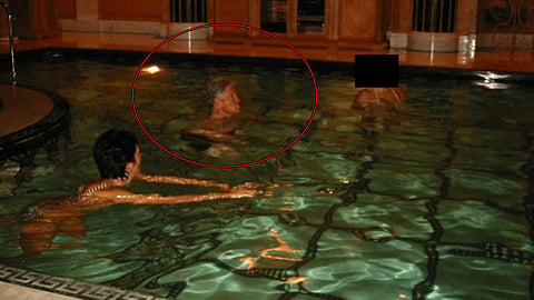 Former US President Bill Clinton was seen alongside Epstein associate Ghislaine Maxwell and another woman in the new Epstein files. (DOJ)