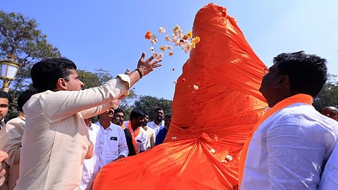 Ballari MLA Nara Bharath Reddy offering floral tribute to the statue of Maharshi Valmiki 