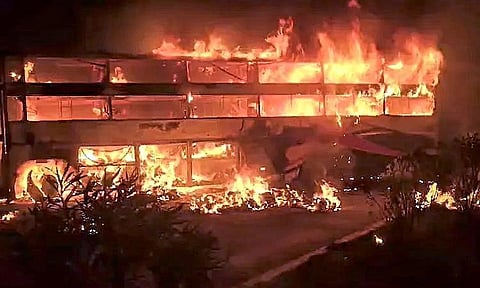 A private bus and lorry caught fire after collision in Andhra Pradesh's Nandyal district 