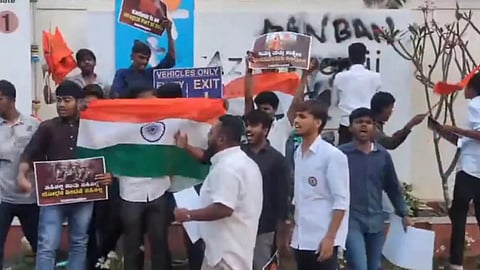 ABVP activists smeared black ink on the university’s name board as a mark of protest.