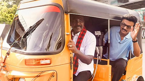 M K Stalin in auto 