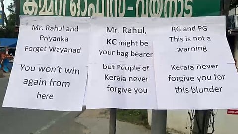 Posters targeting Rahul, Priyanka Gandhi surface outside Wayanad District Congress Committee office
