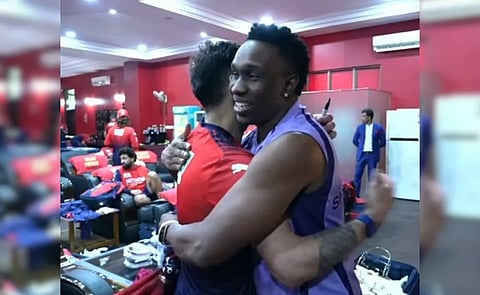Virat Kohli with Dwayne Bravo