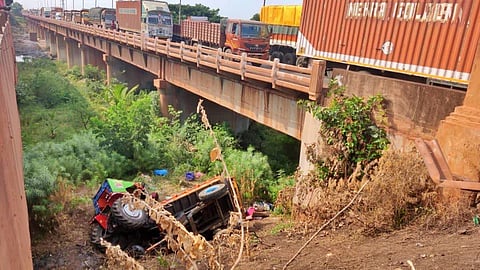  tractor falls off bridge