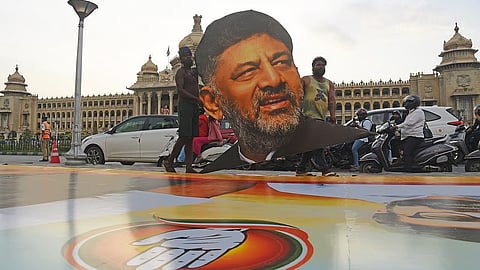Structures getting ready for the posters in front of Vidhana Soudha and posters of designated CM DK Shivakumar ahead of swearing-in, in Bengaluru on Monday.