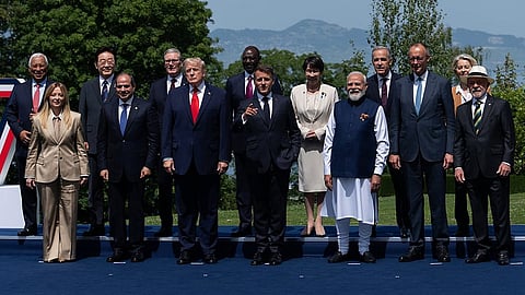 Leaders gather for a group photo at the G7 summit, Tuesday, June 16, 2026, in Evian-les-Bains, France. 