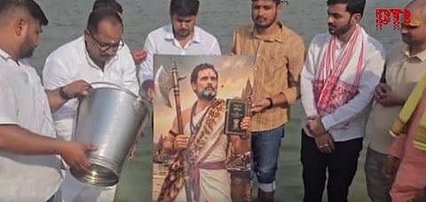 Milk pouring in Ganga river to Rahul Gandhi potrait 