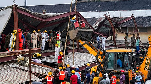 Officials and others gather during a rescue operation.