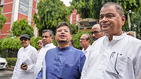West Bengal Leader of the Opposition Ritabrata Banerjee, centre, speaks to the media outside Nirvachan Sadan