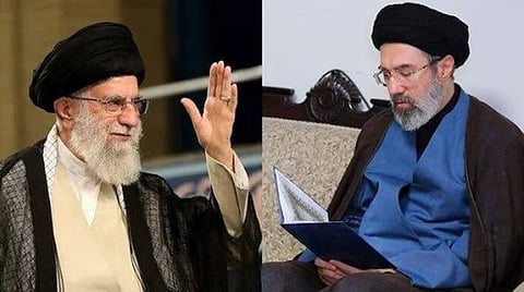 Ayatollah Ali Khamenei and his son Mojtaba Khamenei