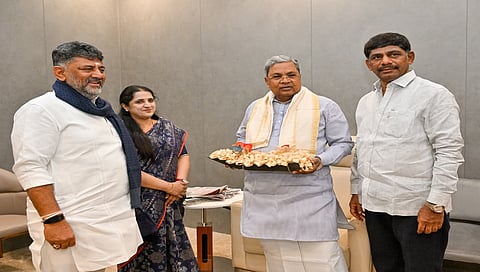 CM DK Shivakumar, his wife Usha and brother and former MP DK Suresh, call on former CM Siddaramaiah at the latter’s residence
