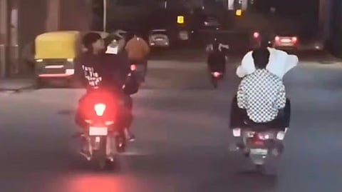 Bikers Perform Stunts