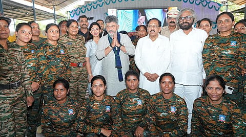 D.K. Shivakumar with members of Akka Pade at Basava Kalyan in Bidar district on Monday