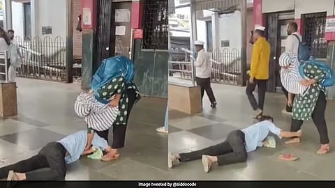 Young Man Clings To Woman's Feet At Mumbai Station, Viral Clip Sparks Curiosity