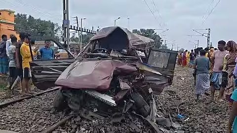 Two school children killed as train rams pool car