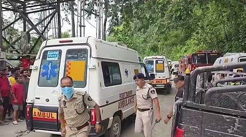 Police personnel at site as rescue operation is underway