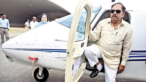 Deputy Chief Minister Dr G Parameshwara inspects an aircraft at the Government Flying Training School at Jakkur in Bengaluru on Friday.