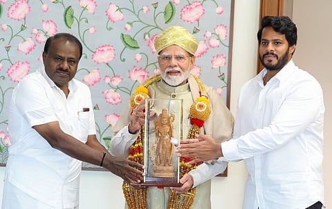 Minister HD Kumaraswamy, JDS leader Nikhil meet PM Modi in Delhi
