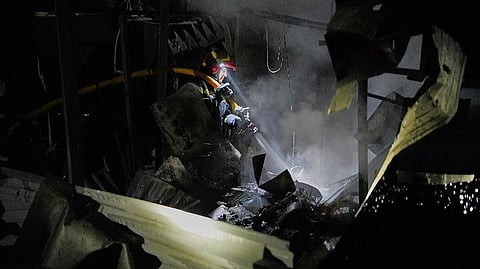 In this photo provided by the Ukrainian Emergency Service, firefighters put out a fire following a Russian missile attack in Kyiv, Ukraine, Tuesday, Sept. 1, 2026.