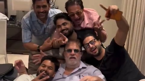MS Dhoni and Rishabh Pant were joined by their friends, all smiles as they posed for the camera.
