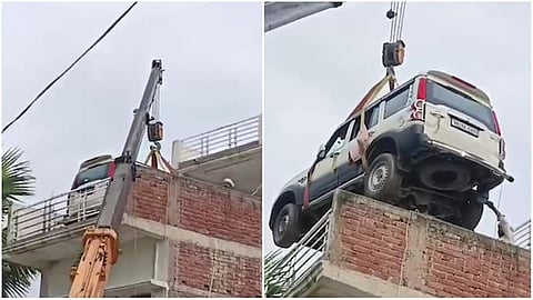 man lifts new SUV to 2nd-floor rooftop with crane to protect it from theft