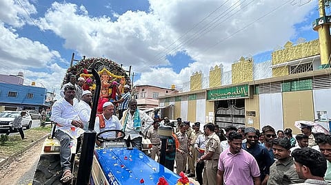 members of the Muslim, lead in organizing the Lord Ganesha immersion procession