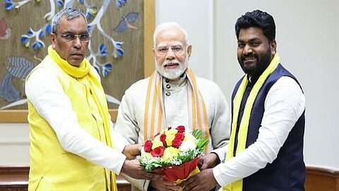 SBSP chief Om Prakash Rajbhar and his son Arvind with Prime Minister Narendra Modi